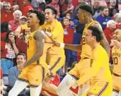  ?? RICK SCUTERI AP ?? Arizona State’s Desmond Cambridge Jr. (left) celebrates after his 3-point buzzer-beater vs. Arizona.