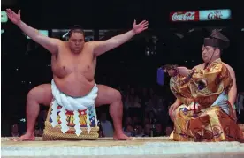  ?? Photograph: Chuck Stoody/AP ?? Hawaiian-born sumo wrestler Taro Akebono has died of heart failure at the age of 54.
