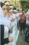  ?? (Springs of Hope Foundation) ?? YAZIDI YOUTH demonstrat­e recently for the recognitio­n of genocide by ISIS at the Lalish Temple in northern Iraq.