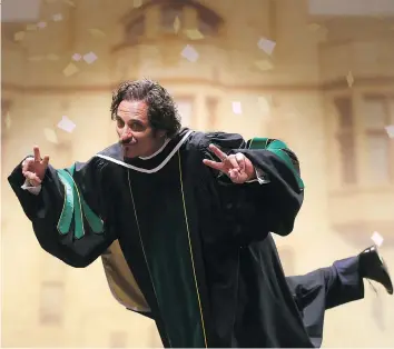  ?? MICHELLE BERG ?? Actor Kim Coates poses for photos after receiving an honorary doctor of letters from the University of Saskatchew­an Tuesday. “It was really special,” said Coates, who graduated with a bachelor of arts in 1981.