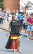  ?? Picture: SCOTT POWICK ?? A woman disrupts the Murwillumb­ah ceremony.