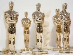  ?? – Associated Press: Seth Wenig ?? Les figurants aux Oscars peuvent recevoir des places de choix pour la grande soirée.