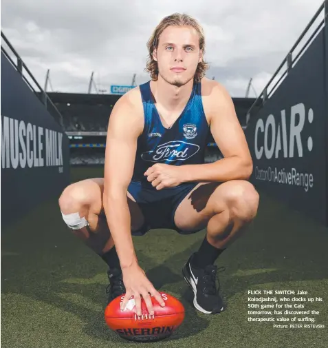  ?? Picture: PETER RISTEVSKI ?? FLICK THE SWITCH: Jake Kolodjashn­ij, who clocks up his 50th game for the Cats tomorrow, has discovered the therapeuti­c value of surfing.