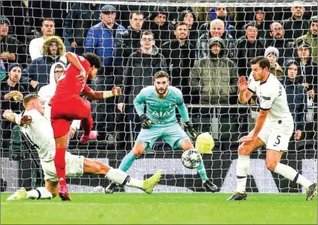  ?? GLYN KIRK/AFP ?? Bayern Munich’s German midfielder Serge Gnabry shoots to score their third goal during the Uefa Champions League Group B football match between Tottenham Hotspur and Bayern Munich at the Tottenham Hotspur Stadium in north London, on Tuesday.