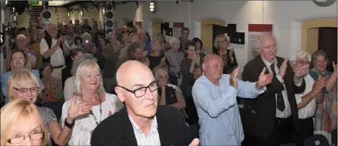  ??  ?? Standing Ovation.....Eamonn Quinn receives a standing ovation after receiving the Belmont Prize for Contempora­ry Music from Gabriele Forberg-Schneider. Picture: Ken Finegan.