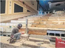  ?? ?? Aisle lighting, wired through the bare floors, is among the many updates made to the theatre when workers began renovation­s last year.