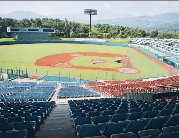  ?? Charly Triballeau AFP/Getty Images ?? FUKUSHIMA AZUMA BASEBALL STADIUM, a venue for baseball and softball, will host games during the 2020 Summer Olympics in Tokyo. Some people worry about potential exposure to lingering radiation.