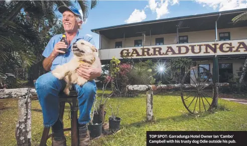  ??  ?? TOP SPOT: Garradunga Hotel Owner Ian ‘Cambo’ Campbell with his trusty dog Odie outside his pub.