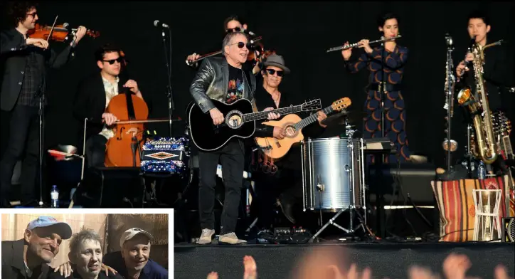  ??  ?? ONE OF POP’S TRUE GIANTS: Paul Simon thrills his jubilant audience as he belts out another song during his ‘Homeward Bound’ tour in Dublin. Photo: Steve Humphreys. Inset, Woody Harrelson, Shane MacGowan and Paul Simon pose for the camera