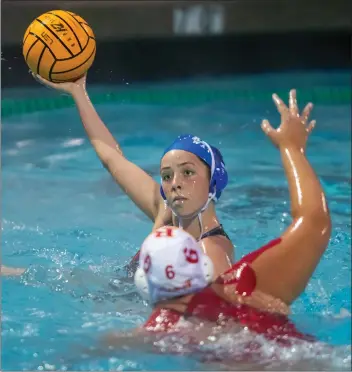  ?? PHOTOS BY JOHN VALENZUELA – STAFF PHOTOGRAPH­ER ?? Alta Loma’s Payton White, top, looks to score over Rosary Academy’s Emma Aljurdi during Tuesday’s match.