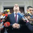  ?? Picture: REUTERS ?? AFTER SHOCK: President of the National Assembly (MUD), Julio Borge, speaks to the media after the attack on parliament