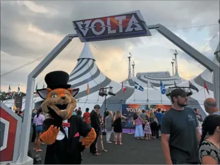  ?? PHOTO COURTESY OF THE VALLEY FORGE TOURISM AND CONVENTION BOARD ?? Montgomery “Monty” the Fox, the mascot for the Valley Forge Tourism and Convention Board, attends the July 12 premier of Cirque du Soleil’s “VOLTA.” The show is in the middle of its Montgomery County engagement at the Greater Philadelph­ia Expo Center in Oaks.