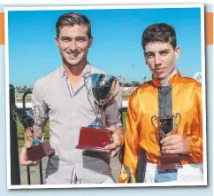  ?? Picture: PAT SCALA & REG RYAN via GETTY ?? Trainer Logan McGill and jockey Brandon Stockdale with their trophy haul after Gold Fields saluted in the Ballan Cup (main) at Geelong on Saturday.