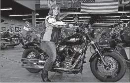  ?? [IVAN MORENO/THE ASSOCIATED PRESS] ?? Terri Meehan, 42, took a motorcycle safety course from Harley- Davidson because she wanted to learn from “an expert who could teach right way versus someone who had learned bad habits.”