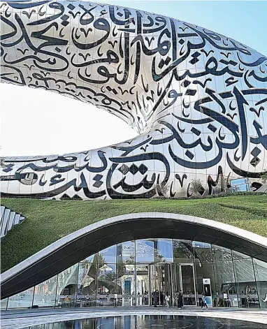  ?? Shuttersto­ck ?? Embossed in Arabic calligraph­y on 1,024 stainless steel panels on the museum’s facade is a message of hope for the future.