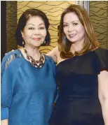  ??  ?? Mimi Valerio and Madison Galeries owner Joy Rustia.