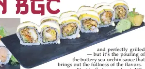  ?? ?? This is how we roll: The Smoked Salmon and Soft Shell Crab sushi rolls