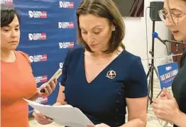  ?? ANTHONY MAN/SOUTH FLORIDA SUN SENTINEL ?? Florida Democratic Chair Nikki Fried reviews statistics about teacher vacancies before speaking at a Florida Democratic Party meeting in August in West Palm Beach.