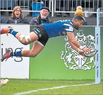  ??  ?? Bath wing Joe Cokanasiga dives over for a try against Newcastle