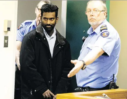  ?? CHRISTINNE MUSCHI ?? The Immigratio­n and Refugee Board issued a removal order against Sivalogana­than Thanabalas­ingham, 31, shown at his hearing on Monday, because he had been previously convicted of assaulting his wife.