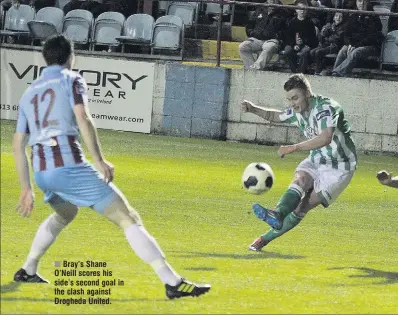  ??  ?? Bray’s Shane O’Neill scores his side’s second goal in the clash against Drogheda United.