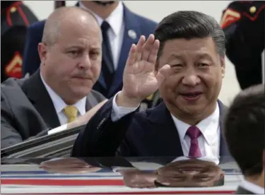  ?? LYNNE SLADKY — THE ASSOCIATED PRESS ?? Chinese president Xi Jinping waves after arriving at the Palm Beach Internatio­nal Airport in West Palm Beach, Fla., Thursday.