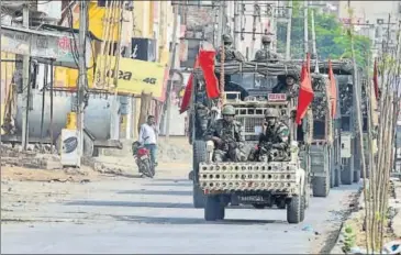  ?? AP ?? Army personnel carry out flag march in Sirsa, Haryana on Saturday.