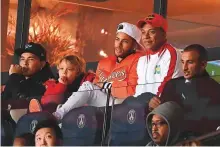  ?? AFP ?? PSG’s Neymar (centre) and Kylian Mbappe watch their team take on Toulouse in Ligue 1.