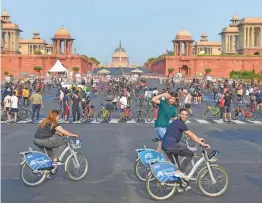  ?? — PTI ?? Youngsters ride bicycles at Raisina Hill during unlock 3.0 in New Delhi on Sunday.