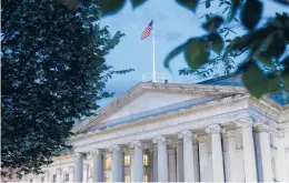  ?? PATRICK SEMANSKY/AP ?? The new law seeks to strengthen the tools used by the Treasury Department to track shell companies. Above, the Treasury Department building in Washington.