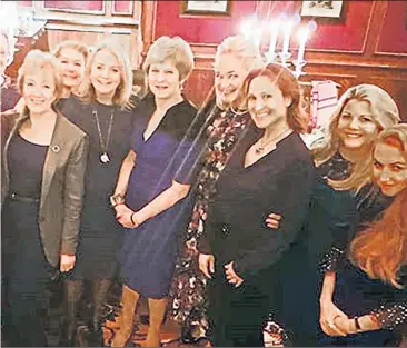  ??  ?? Then prime minister Theresa May and six cabinet members enjoy a “girls’ night out” with the wife of a former Russian minister and ally of Vladimir Putin, after she paid £135,000 for the privilege. Lubov Chernukhin, pictured on Mrs May’s left, enjoyed the dinner at the Goring Hotel, in Belgravia, London, in May last year – just over a year after the Salisbury poisonings – after successful­ly bidding at a fundraisin­g auction at the Conservati­ve Party’s Black and White ball last year. Mrs Chernukhin’s husband, Vladimir, was formerly an ally of the Russian President although he says he has fallen out with the leader. She also reportedly paid £20,000 for dinner with Ruth Davidson, then leader of the Scottish Tories.