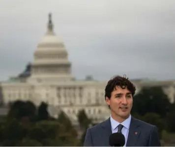  ?? DREW ANGERER/GETTY IMAGES ?? Prime Minister Justin Trudeau has succeeded in charming U.S. President Donald Trump, but thus far has not convinced him that NAFTA is good for the U.S., Thomas Walkom writes.