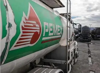  ?? Felix Marquez / Associated Press ?? Mexico’s state-run oil company, Pemex, imported more U.S. gasoline this summer than usual.