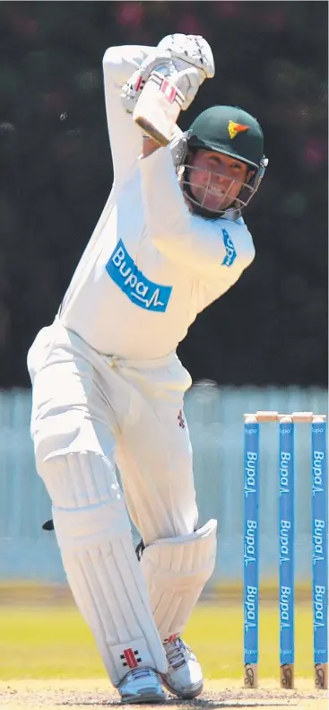  ?? Picture: GETTY ?? BOUNDARY BOUND: Ben Dunk smashes a ball to the fence.