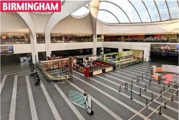  ?? ?? On the plus side, there’s no queue for Pret: A near-deserted New Street station BIRMINGHAM