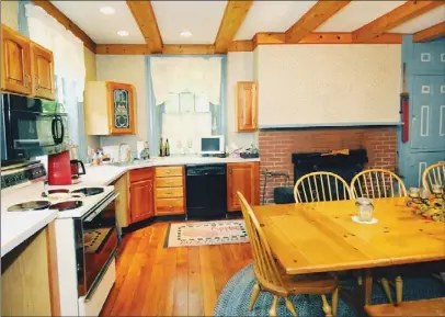  ?? Bob Donaldson/Post-Gazette photos ?? Kitchen of the historic Thomas Wilson Shaw house in Shaler. The five-bedroom home was built in 1824, with an addition in 1830-32. It is on the market for $425,000.