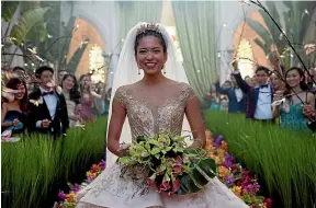  ??  ?? The white chapel at Chijmes was the venue for Crazy Rich Asians’s Araminta and Colin’s gardenthem­ed wedding. WARNER BROS