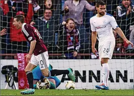  ??  ?? OLD LOYALTIES: Jason Holt scores against Rangers while playing for Hearts