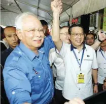  ??  ?? Najib with Liow after the opening of the MCA annual general meeting yesterday.