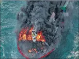  ?? AFP ?? Flames and thick smoke billows from container ship MV X-press Pearl off Sri Lanka’s Colombo Harbour.