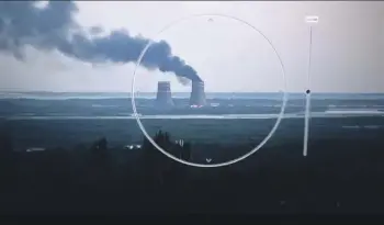  ?? AP ?? In this image from a surveillan­ce camera provided by the Ukrainian Presidenti­al Press Office, smoke rises from a cooling tower of the Zaporizhzh­ia nuclear power station.