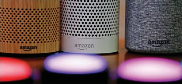  ?? ELAINE THOMPSON / THE ASSOCIATED PRESS FILES ?? Amazon.com employs thousands of people around the world who listen in on transmitte­d conversati­on to help improve the Alexa digital assistant powering its Echo speakers.