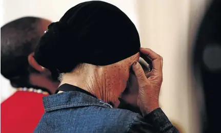  ?? / MASI LOSI ?? A family member of one of the Life Esidimeni deceased patients cries during the closing arguments of the Life Esidimeni arbitratio­n hearing.