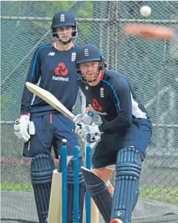  ?? Picture: Getty. ?? England’s Jonny Bairstow bats watched by Joe Root during a nets session in Colombo, Sri Lanka.