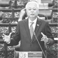  ?? — Gambar Bernama ?? JAWAB: Ismail Sabri menjawab soalan pada Mesyuarat Kedua Penggal Kelima Parlimen ke-14 bagi Dewan Rakyat di Bangunan Parlimen dekat Kuala Lumpur, semalam.