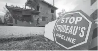  ?? DARRYL DYCK / THE CANADIAN PRESS FILES ?? A protest camp outside a Kinder Morgan terminal in Burnaby, B.C., in August.