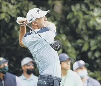  ??  ?? 0 Martin Laird plays his shot from the ninth tee during the second round of the Masters at Augusta