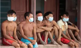  ??  ?? Yanomami people wear face mask as they attend a health brigade by the Brazilian army in Alto Alegre municipali­ty, Roraima state, last June. Photograph: Joédson Alves/EPA