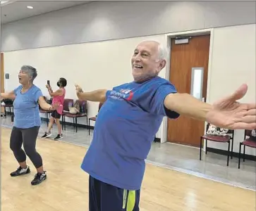  ?? Steve Lopez Los Angeles Times ?? HOMI GANDHI, a regular at Culver City Senior Center’s MindBody dance class, says he embraces Zoom and other technology because he doesn’t want to get left behind. “There’s no other way out,” Gandhi says.