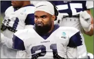 ?? AP/LM Otero) ?? Dallas Cowboys running back Ezekiel Elliott is in training camp with the team despite not working out for a month when he was stricken with covid-19.